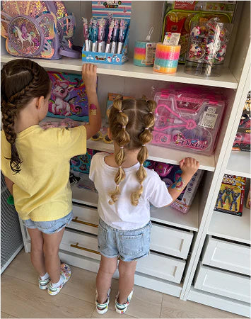 Two children looking at toys in a store