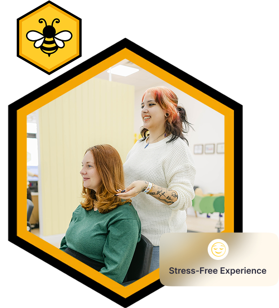 Woman getting a hair treatment with a bee logo and 'Stress-Free Experience' text.